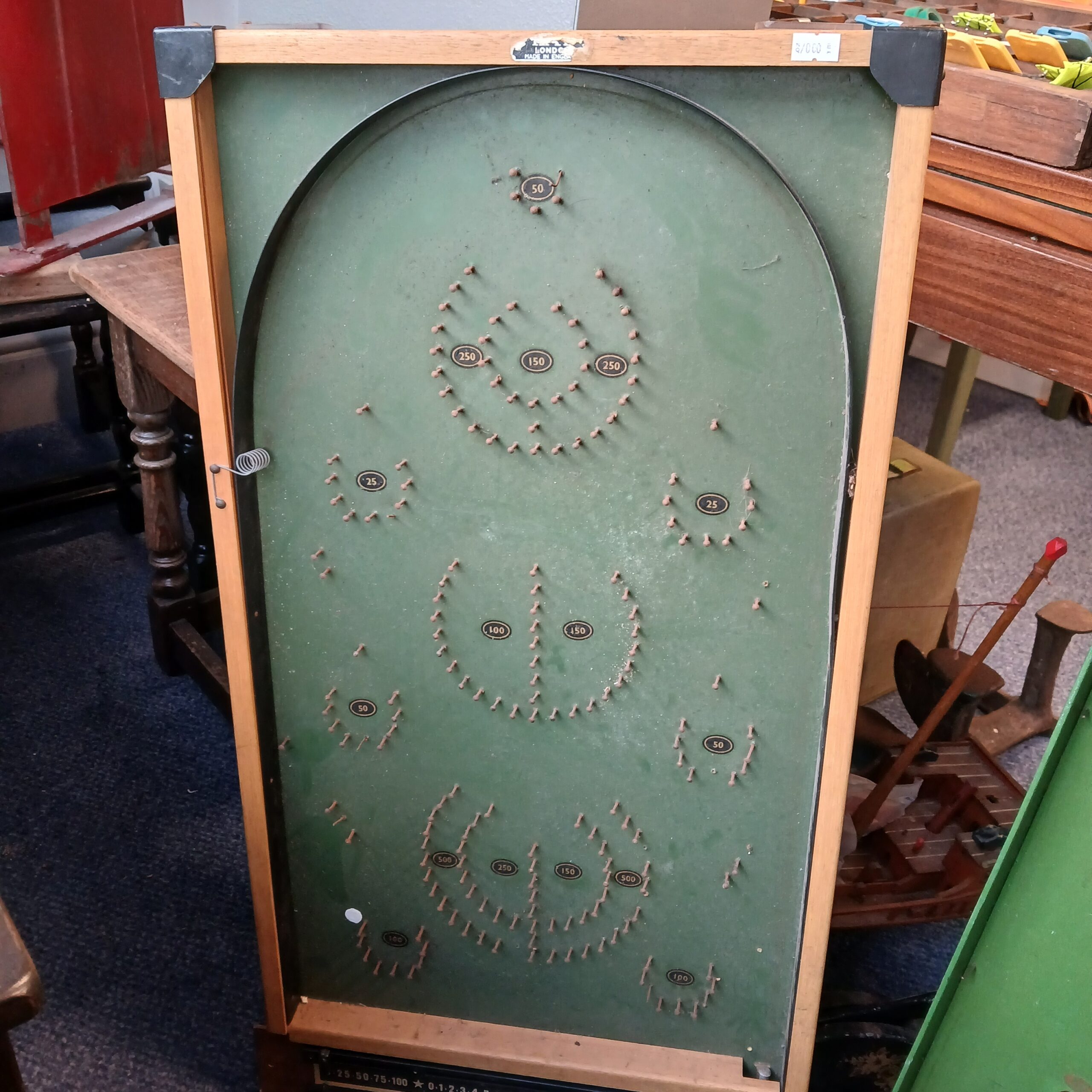 Bagatelle working game with marbles